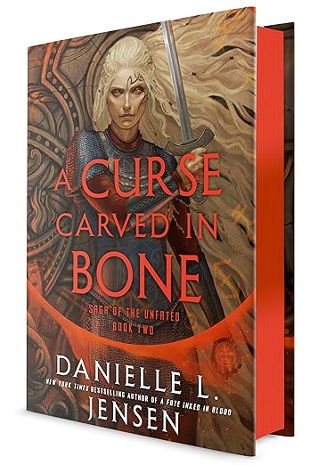 A Curse Carved In Bone - Danielle L. Jensen